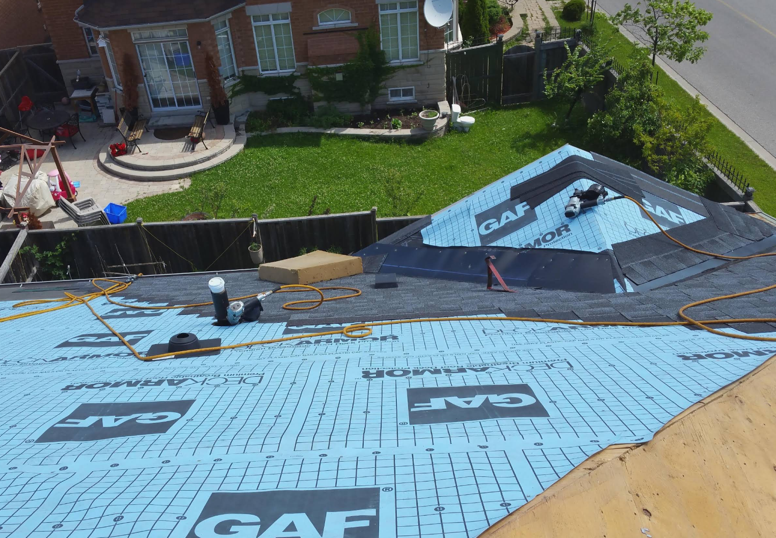 Aerial view of a roof replacement in progress